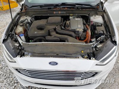 Zdjęcie 11 z 12 samochodu: 2017 FORD FUSION SE HYBRID VIN:3FA6P0LU9HR409720 - miniatura