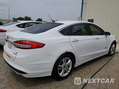 Trzecie zdjęcie samochodu z tyłu: 2018 FORD FUSION SE HYBRID VIN:3FA6P0LU7JR171890 - miniatura