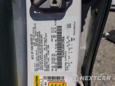 Zdjęcie 12 z 13 samochodu: 2018 FORD FUSION SE HYBRID VIN:3FA6P0LU0JR129836 - miniatura