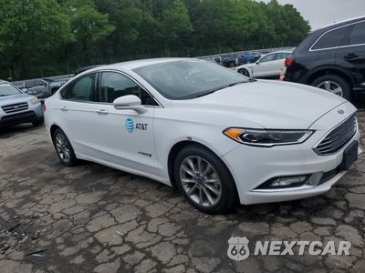 Czwarte zdjęcie samochodu z boku: 2017 FORD FUSION SE HYBRID VIN:3FA6P0LU9HR409636 - miniatura