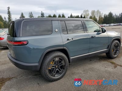 Trzecie zdjęcie samochodu z tyłu: 2025 RIVIAN R1S PREMIUM VIN:7PDSGCBPXSN068546 - miniatura