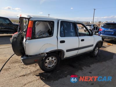 Trzecie zdjęcie samochodu z tyłu: 1999 HONDA CR-V LX VIN:JHLRD2842XC007705 - miniatura