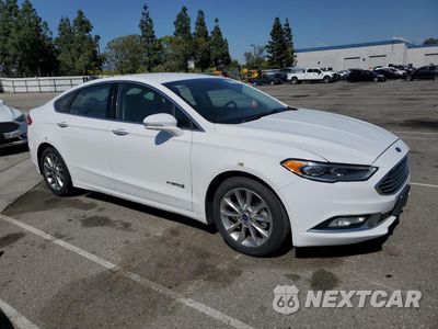 Czwarte zdjęcie samochodu z boku: 2017 FORD FUSION SE HYBRID VIN:3FA6P0LU6HR409285 - miniatura