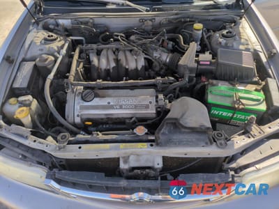 Zdjęcie 12 z 14 samochodu: 1999 NISSAN MAXIMA GLE VIN:JN1CA21A9XT707073 - miniatura