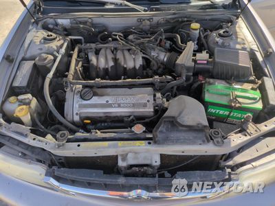 Zdjęcie 12 z 14 samochodu: 1999 NISSAN MAXIMA GLE VIN:JN1CA21A9XT707073 - miniatura