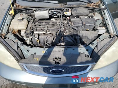 Zdjęcie 11 z 12 samochodu: 2004 FORD FOCUS ZX4 VIN:1FAHP34N06W142317 - miniatura