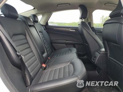 Zdjęcie 10 z 12 samochodu: 2017 FORD FUSION SE HYBRID VIN:3FA6P0LUXHR359667 - miniatura