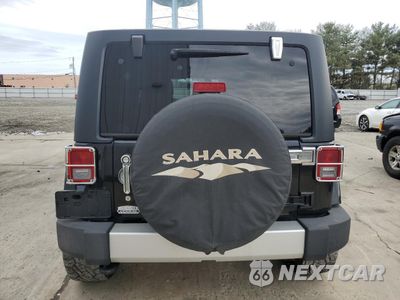 Zdjęcie 6 z 12 samochodu: 2011 JEEP WRANGLER UNLIMITED SAHARA VIN:1J4BA5H19BL615464 - miniatura