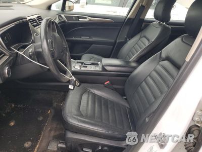 Zdjęcie 7 z 12 samochodu: 2017 FORD FUSION SE HYBRID VIN:3FA6P0LU8HR409269 - miniatura