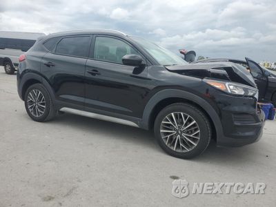 Czwarte zdjęcie samochodu z boku: 2021 HYUNDAI TUCSON LIMITED VIN:KM8J33AL1MU313980 - miniatura
