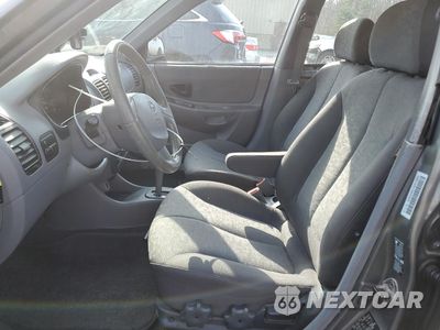 Zdjęcie 7 z 12 samochodu: 2004 HYUNDAI ACCENT GL VIN:KMHCG45C14U513691 - miniatura