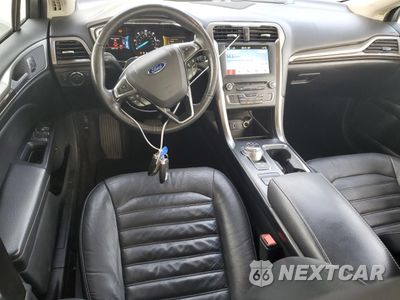 Zdjęcie 8 z 12 samochodu: 2017 FORD FUSION SE HYBRID VIN:3FA6P0LU7HR359688 - miniatura