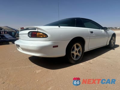 Czwarte zdjęcie samochodu z boku: 1997 CHEVROLET CAMARO BASE VIN:2G1FP22KXV2124842 - miniatura