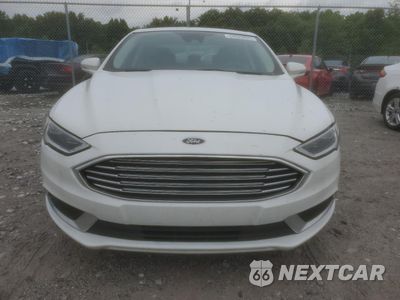 Piąte zdjęcie samochodu w środku: 2018 FORD FUSION SE HYBRID VIN:3FA6P0LU7JR118607 - miniatura
