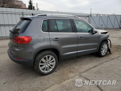 Trzecie zdjęcie samochodu z tyłu: 2014 VOLKSWAGEN TIGUAN S VIN:WVGAV3AXXEW556593 - miniatura