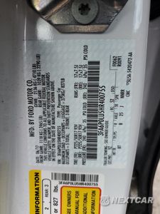 Zdjęcie 12 z 13 samochodu: 2017 FORD FUSION SE HYBRID VIN:3FA6P0LU5HR400755 - miniatura