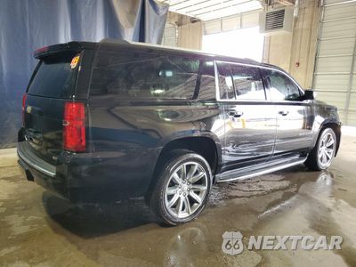 Trzecie zdjęcie samochodu z tyłu: 2018 CHEVROLET SUBURBAN K1500 PREMIER VIN:1GNSKJKCXJR290901 - miniatura
