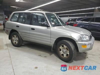 Czwarte zdjęcie samochodu z boku: 2000 TOYOTA RAV4 VIN:JT3GP10V8Y0050351 - miniatura