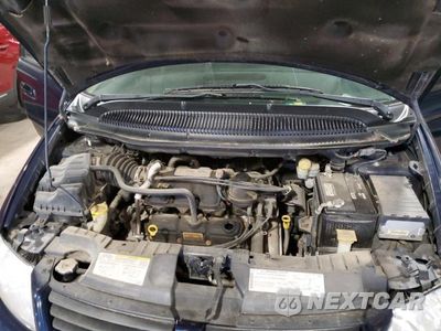 Zdjęcie 12 z 13 samochodu: 2005 DODGE GRAND CARAVAN SXT VIN:2D4GP44L65R581025 - miniatura