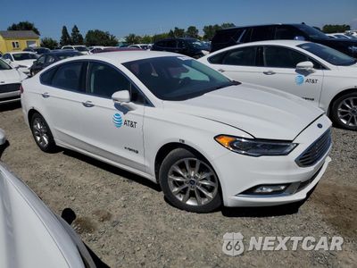 Czwarte zdjęcie samochodu z boku: 2017 FORD FUSION SE HYBRID VIN:3FA6P0LUXHR408950 - miniatura