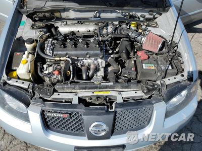 Zdjęcie 12 z 14 samochodu: 2004 NISSAN SENTRA SE-R SPEC V VIN:3N1AB51D04L734565 - miniatura
