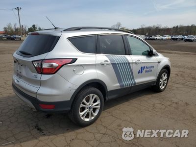 Trzecie zdjęcie samochodu z tyłu: 2018 FORD ESCAPE SE VIN:1FMCU9GD8JUD24947 - miniatura