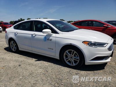Czwarte zdjęcie samochodu z boku: 2018 FORD FUSION SE HYBRID VIN:3FA6P0LU7JR171551 - miniatura