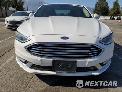Piąte zdjęcie samochodu w środku: 2017 FORD FUSION SE HYBRID VIN:3FA6P0LU5HR400707 - miniatura