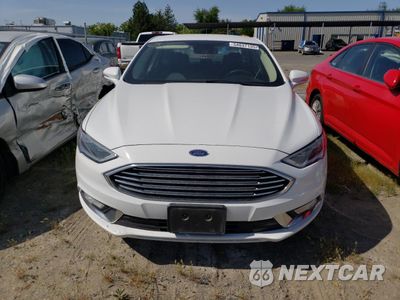 Piąte zdjęcie samochodu w środku: 2017 FORD FUSION SE HYBRID VIN:3FA6P0LU7HR408940 - miniatura