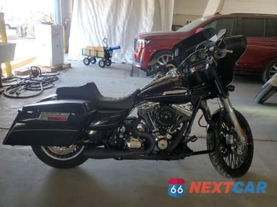 2011 HARLEY-DAVIDSON FLHTK 1HD1KEM15BB660930 - główne zdjęcie licytacji z USA - miniatura