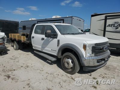 Czwarte zdjęcie samochodu z boku: 2019 FORD F550 SUPER DUTY VIN:1FD0W5HT7KEE14629 - miniatura