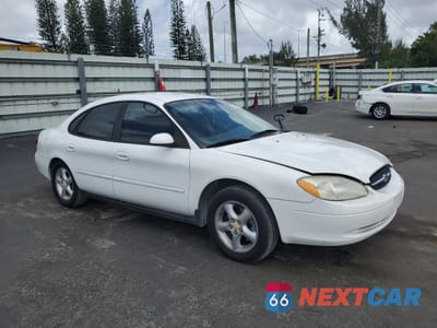 Czwarte zdjęcie samochodu z boku: 2001 FORD TAURUS SES VIN:1FAFP55U71A175751 - miniatura