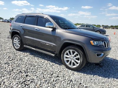 Czwarte zdjęcie samochodu z boku: 2017 JEEP GRAND CHEROKEE LIMITED VIN:1C4RJFBT0HC781742 - miniatura