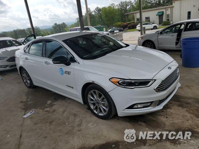 Czwarte zdjęcie samochodu z boku: 2017 FORD FUSION SE HYBRID VIN:3FA6P0LU6HR409481 - miniatura