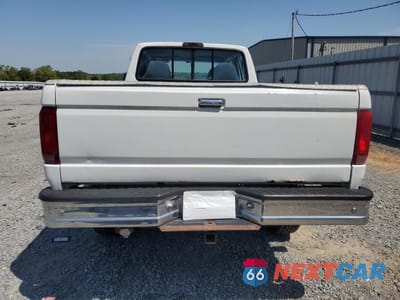 Zdjęcie 6 z 12 samochodu: 1997 FORD F350 VIN:1FTJW36F4VEA62432 - miniatura