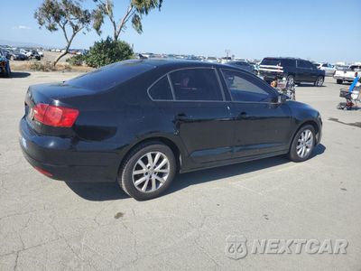 Trzecie zdjęcie samochodu z tyłu: 2012 VOLKSWAGEN JETTA SE VIN:3VWDP7AJ7CM451650 - miniatura