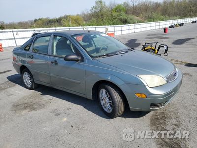 Czwarte zdjęcie samochodu z boku: 2004 FORD FOCUS ZX4 VIN:1FAHP34N06W142317 - miniatura