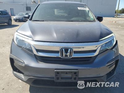 Piąte zdjęcie samochodu w środku: 2019 HONDA PILOT LX VIN:5FNYF5H14KB047113 - miniatura