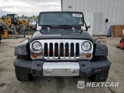 Piąte zdjęcie samochodu w środku: 2011 JEEP WRANGLER UNLIMITED SAHARA VIN:1J4BA5H19BL615464 - miniatura