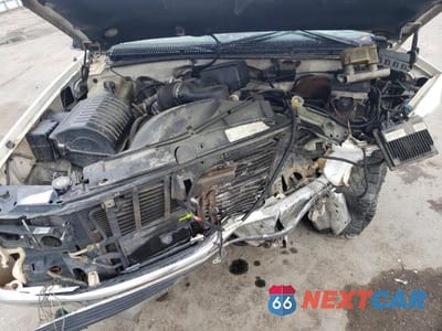Zdjęcie 12 z 13 samochodu: 1999 CHEVROLET TAHOE K1500 VIN:1GNEK13R8XJ398392 - miniatura