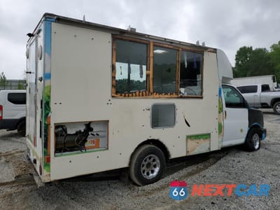 Trzecie zdjęcie samochodu z tyłu: 2013 CHEVROLET EXPRESS G3500 VIN:1GB0G2BA3D1123177 - miniatura