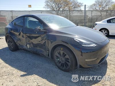 Czwarte zdjęcie samochodu z boku: 2023 TESLA MODEL Y VIN:7SAYGDEE5PA189136 - miniatura