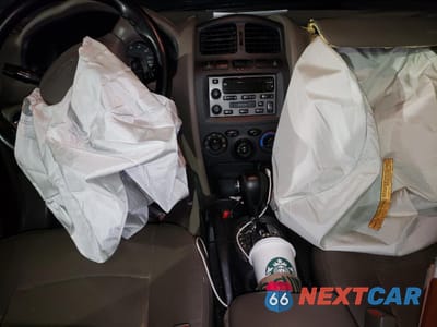 Zdjęcie 8 z 12 samochodu: 2004 HYUNDAI SANTA FE GLS VIN:KM8SC13D74U847113 - miniatura