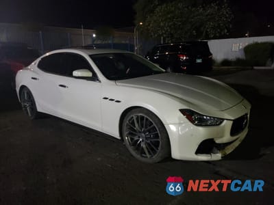 Czwarte zdjęcie samochodu z boku: 2017 MASERATI GHIBLI VIN:ZAM57XSA1H1197259 - miniatura