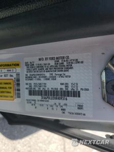 Zdjęcie 12 z 13 samochodu: 2017 FORD FUSION SE HYBRID VIN:3FA6P0LU2HR409316 - miniatura