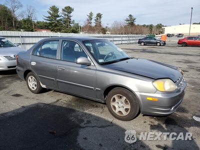 Czwarte zdjęcie samochodu z boku: 2004 HYUNDAI ACCENT GL VIN:KMHCG45C14U513691 - miniatura