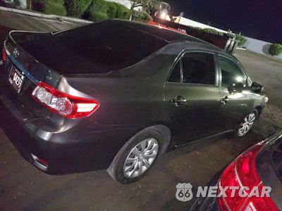 Trzecie zdjęcie samochodu z tyłu: 2013 TOYOTA COROLLA BASE VIN:5YFBU4EE4DP113292 - miniatura