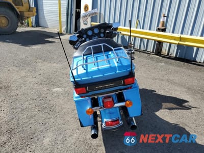 Czwarte zdjęcie samochodu z boku: 2011 HARLEY-DAVIDSON FLHTK VIN:1HD1KEM10BB628306 - miniatura