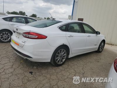 Trzecie zdjęcie samochodu z tyłu: 2017 FORD FUSION SE HYBRID VIN:3FA6P0LU8HR409157 - miniatura