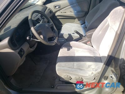 Zdjęcie 7 z 13 samochodu: 2002 NISSAN SENTRA XE VIN:3N1CB51D72L597758 - miniatura